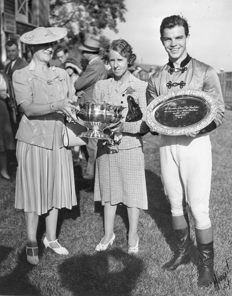   Mrs. Scott accepting the trophy, she was no stranger to the Winner’s Circle, c. 1940’s  